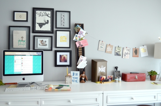 A lovely arrangement of art over her desk adds personality and inspiration (via Kimberly AH)